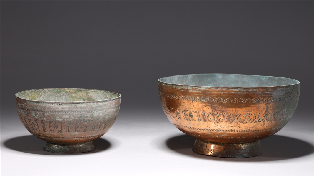 Appraisal: Two antique Indian copper alloy bowls with incised designs to