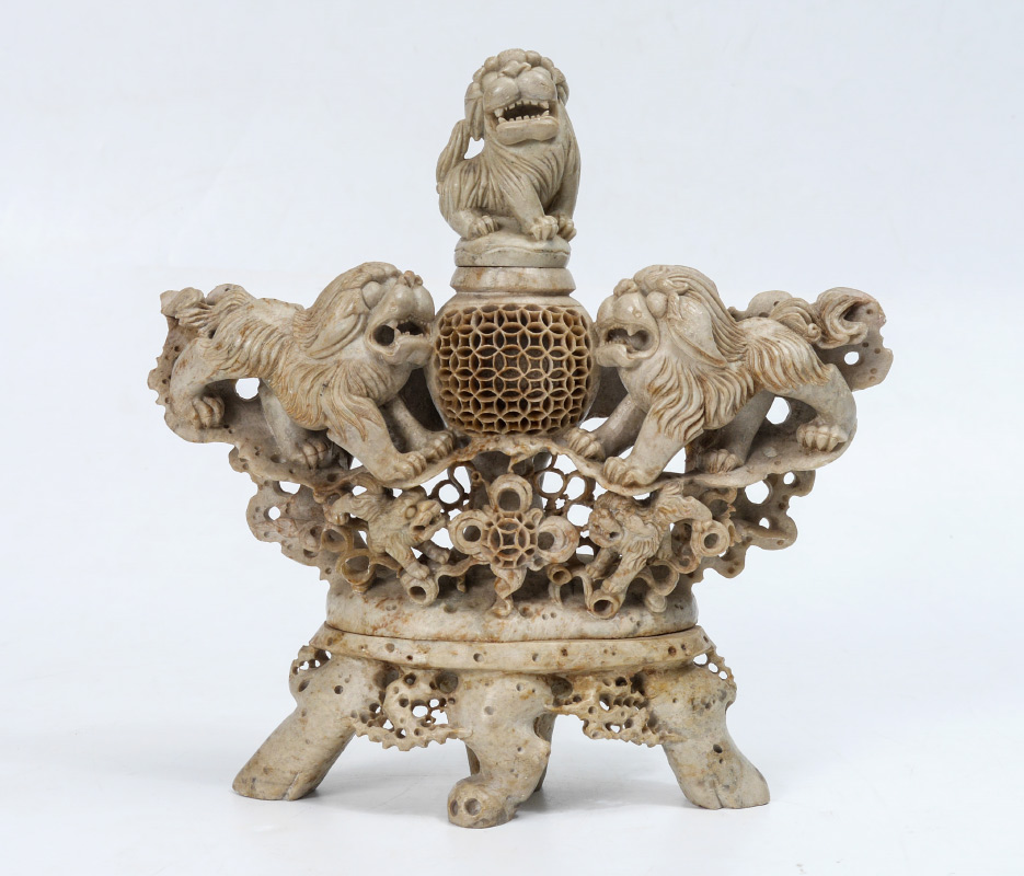 Appraisal: CHINESE CARVED SOAPSTONE FOO DOG CENSOR The sculpture with seated