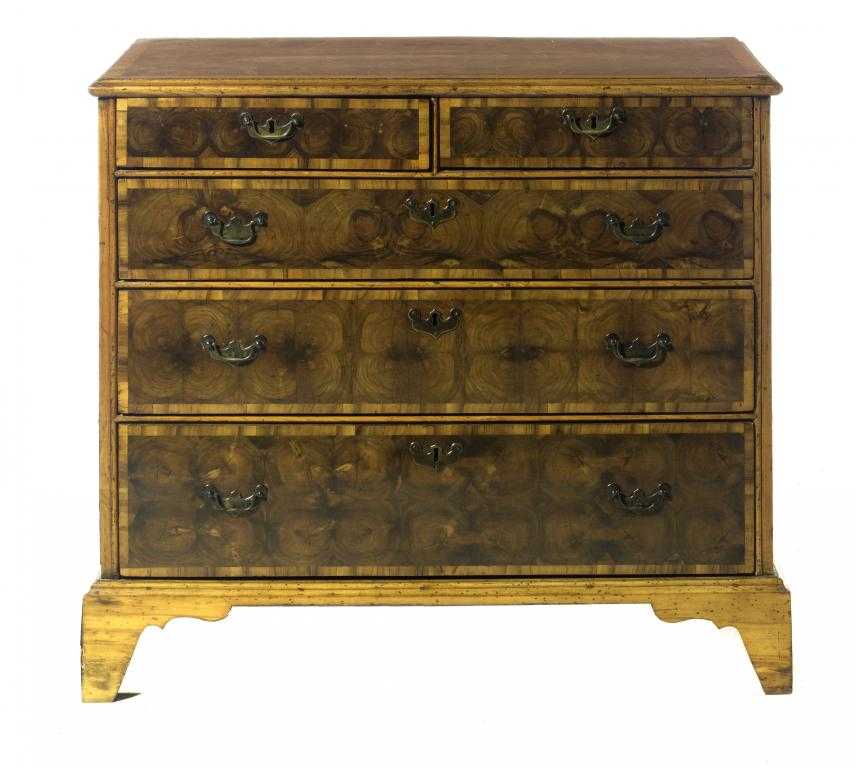 Appraisal: AN ENGLISH WALNUT CROSSBANDED AND OYSTER OLIVE WOOD CHEST OF