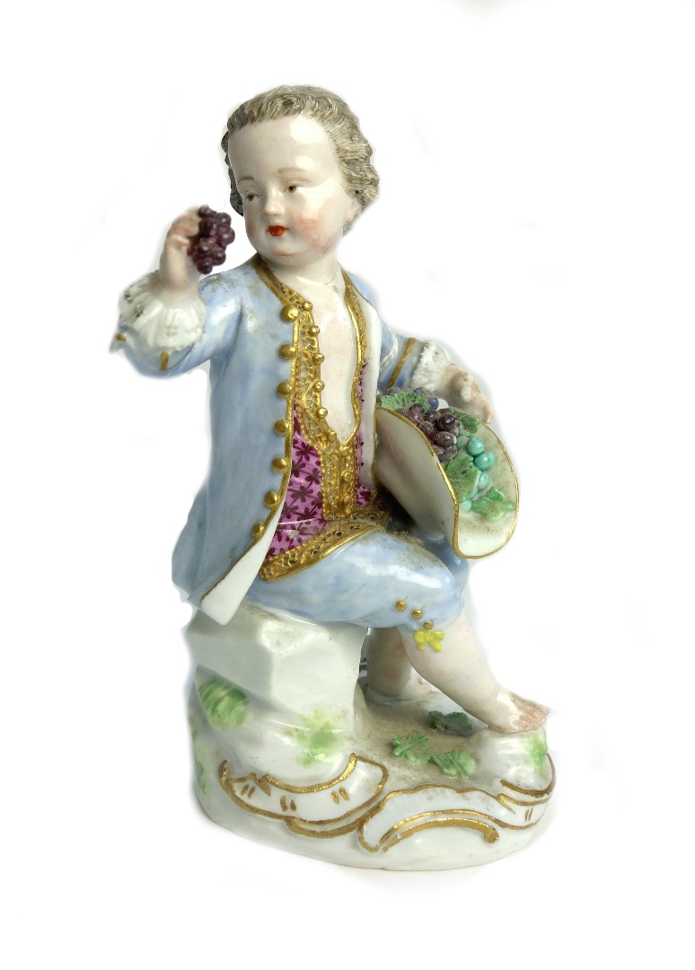 Appraisal: A Meissen figure of a youth circa the boy seated