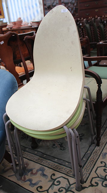 Appraisal: A SET OF FOUR GREEN AND CREAM PLASTIC KITCHEN CHAIRS