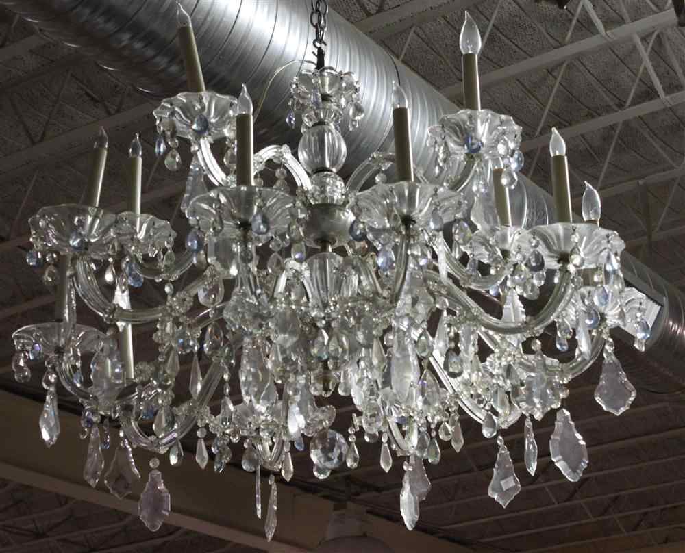 Appraisal: LOUIS XV STYLE SIXTEEN LIGHT TWO TIER CHANDELIER the shaped