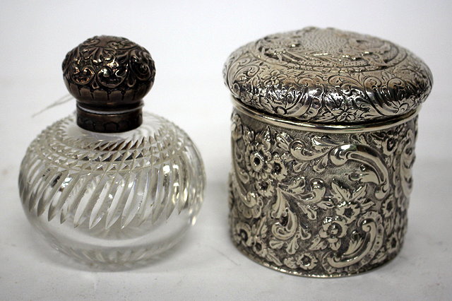 Appraisal: A SILVER TOPPED OVOID CUT GLASS SCENT BOTTLE together with