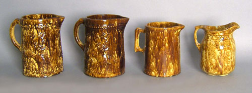 Appraisal: Pair of Rockingham glaze pitchers h together with others h