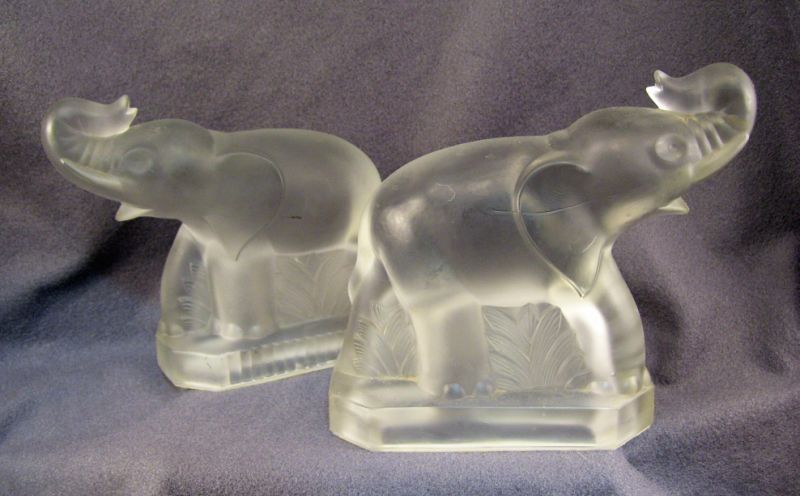 Appraisal: Pair Satin Glass Elephant Figures Hollow satin glass elephant form