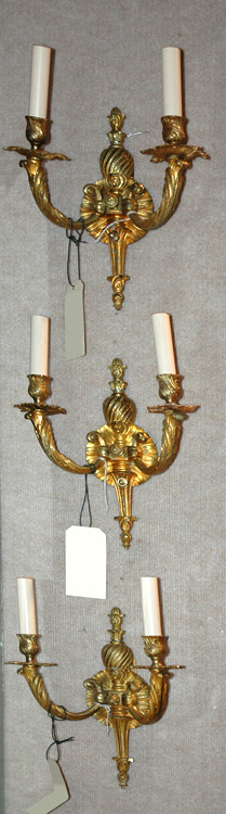 Appraisal: Three Rococo Style Gilt-Bronze Two-Light Scones Estimate -