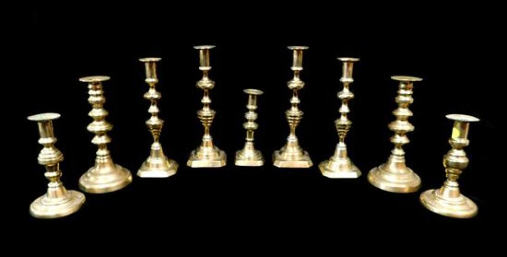 Appraisal: Nine early brass candlesticks including three pairs and three singles