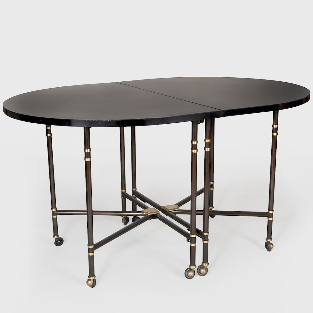 Appraisal: French Black Laminate Steel and Brass Extension Dining Table Maison