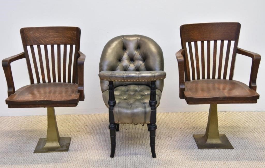 Appraisal: Pair of oak courtroom chairs with brass bases circa together