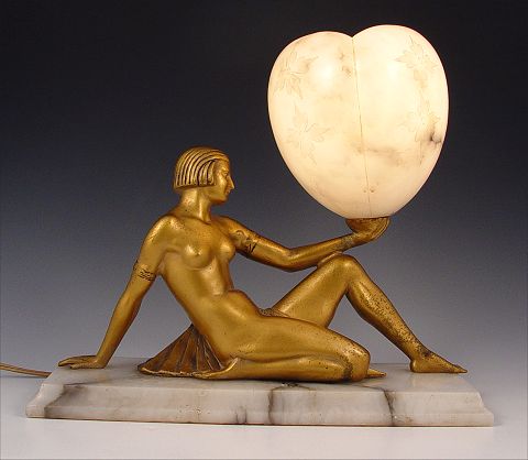 Appraisal: ART DECO NUDE FIGURAL LAMP WITH ALABASTER SHADE Incised carvings