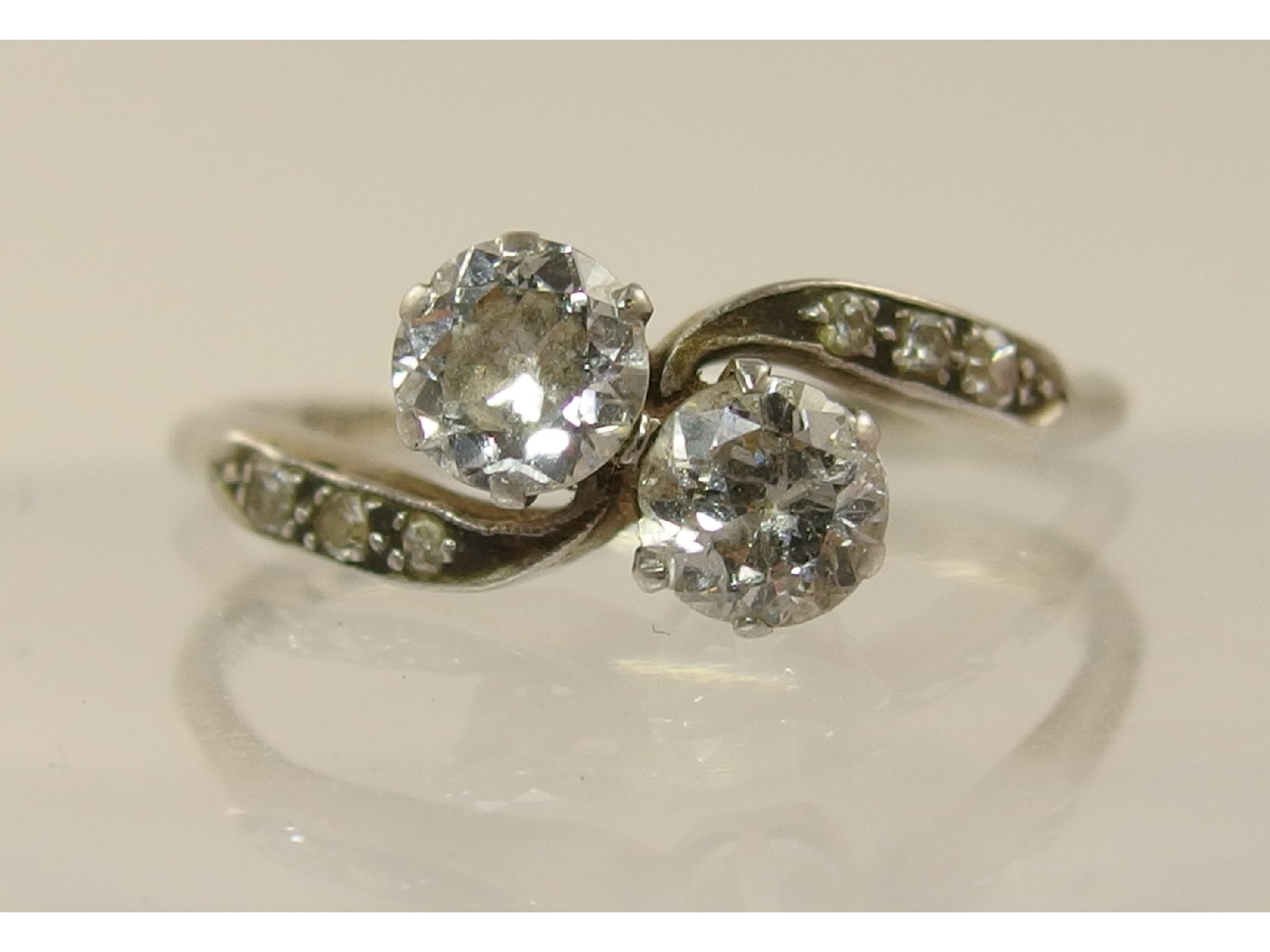 Appraisal: An ct twin stone diamond ringwith further diamonds to the