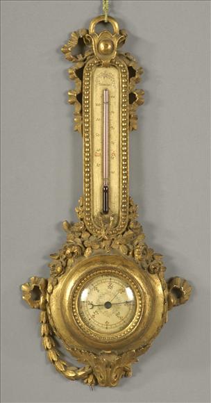 Appraisal: A French giltwood small aneroid wheel barometer Unsigned late th