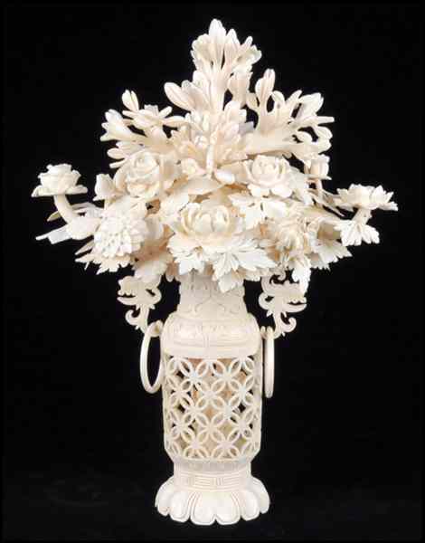 Appraisal: CHINESE CARVED IVORY FLORAL GROUP IN OPEN WORK VASE H