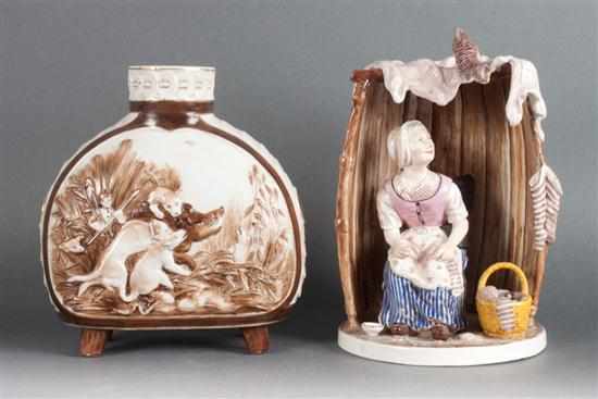 Appraisal: German sepia painted and relief decorated porcelain decanter and a