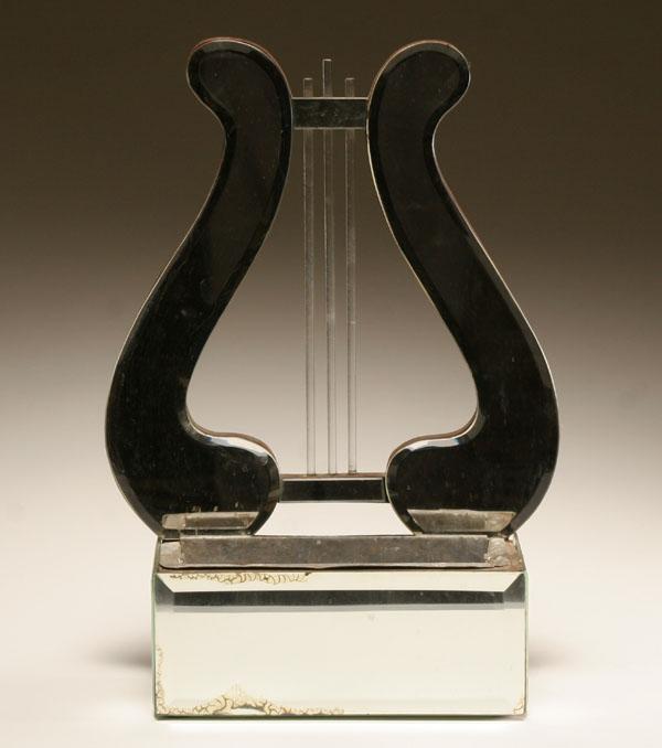 Appraisal: Mirrored lyre form wall planter with lucite strings H Some