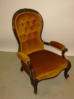 Appraisal: A VICTORIAN WALNUT FRAMED PARLOUR CHAIR of spoon back form