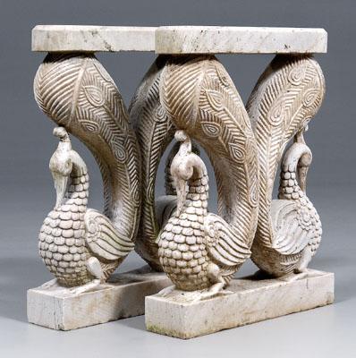 Appraisal: Pair carved stone table supports two stylized peacocks on rectangular