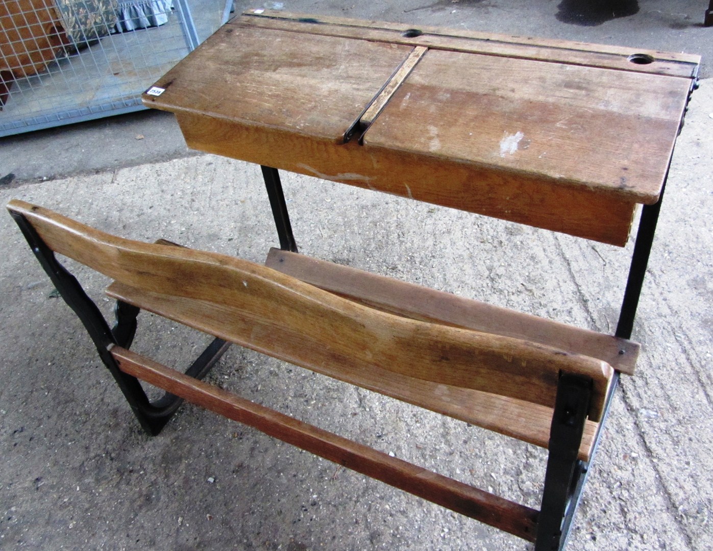 Appraisal: An early th century oak school desk