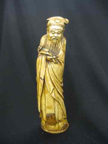 Appraisal: Carved Ivory Figurine of a Scholar holding a scepter ''