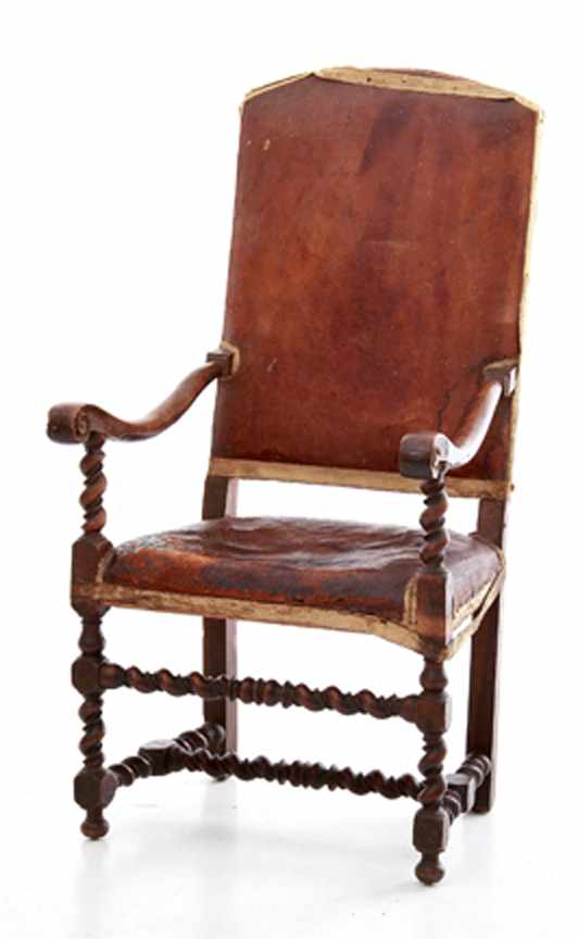 Appraisal: Jacobean style walnut and leather armchair th century arched leather