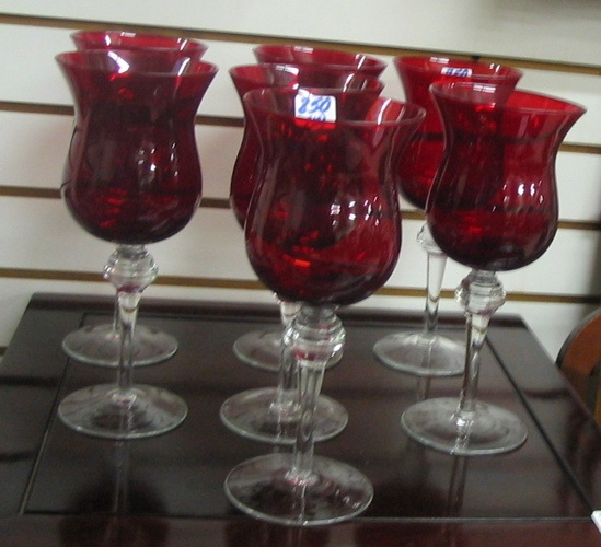 Appraisal: A SET OF ELEVEN RUBY GLASS GOBLETS on clear crystal