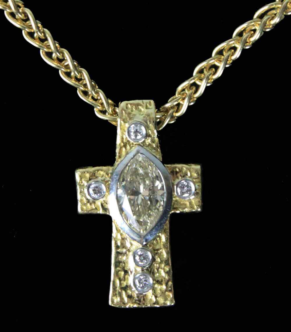 Appraisal: PETER LINDEMAN LADY'S K GOLD AND DIAMOND CROSS NECKLACE the