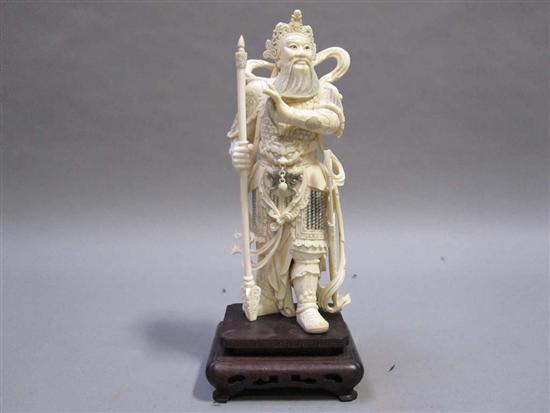 Appraisal: CHINESE POLYCHROME DECORATED CARVED IVORY FIGURE OF A WARRIOR Wearing