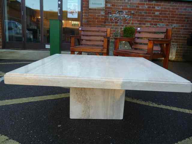 Appraisal: A MODERN LOW MARBLE OCCASIONAL TABLE on a square base