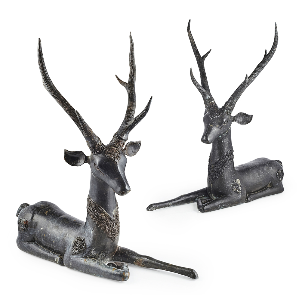 Appraisal: PAIR OF INDIAN BRONZE FIGURES OF DEER the deer shown