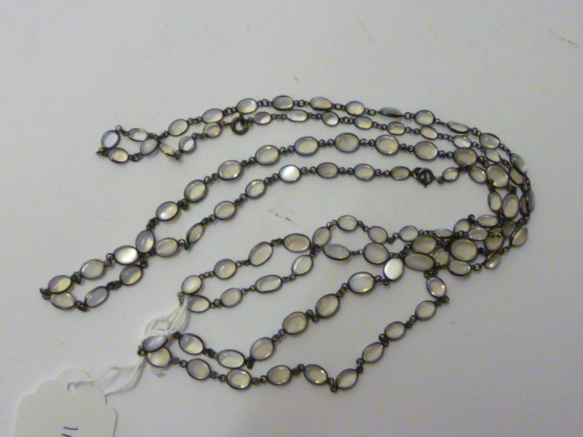 Appraisal: TWO MOONSTONE NECKLACES one set in silver long one in