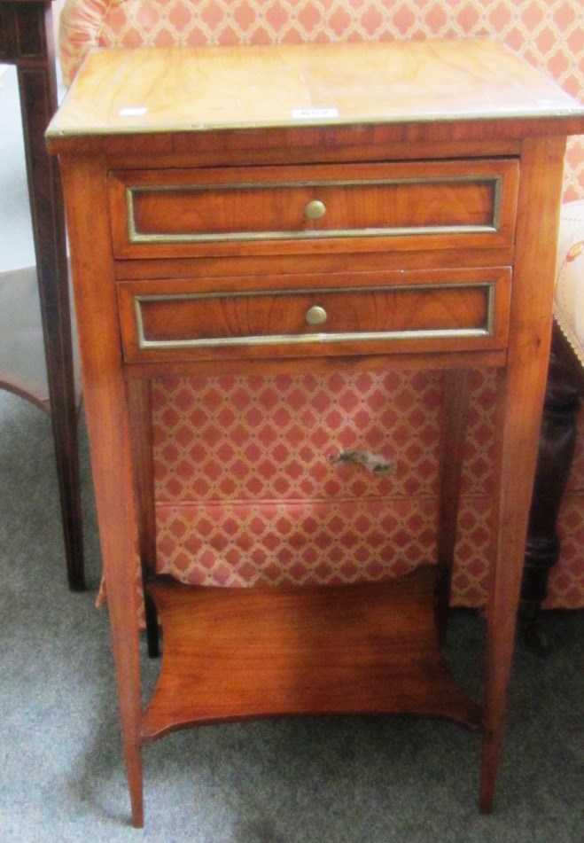 Appraisal: A th century French fruitwood two drawer side table on