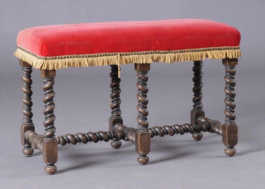 Appraisal: JACOBEAN STYLE CARVED WALNUT LONG BENCH The rose velvet upholstered