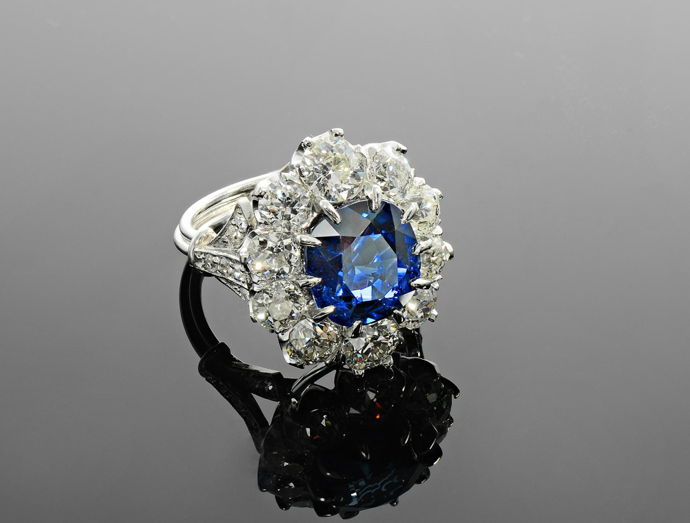 Appraisal: PLATINUM Ct SAPPHIRE Ct DIAMOND RING Outrageous sparkle in this