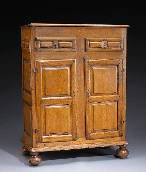 Appraisal: A William and Mary pine cupboard New England The rectangular