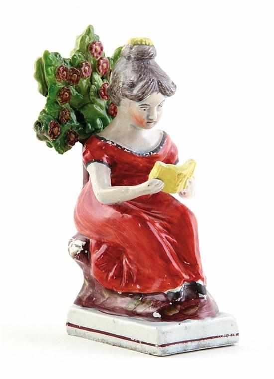 Appraisal: Staffordshire Reading Maid figure th century little girl sitting before