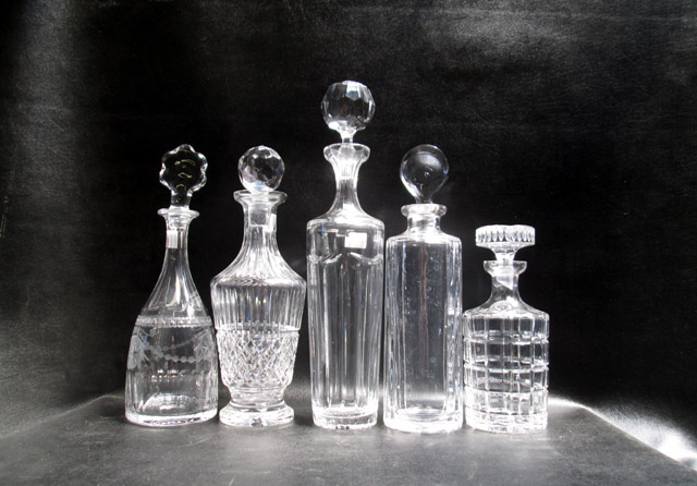 Appraisal: FIVE COLLECTIBLE CRYSTAL LIQUOR DECANTERS one with Tiffany Co watermark