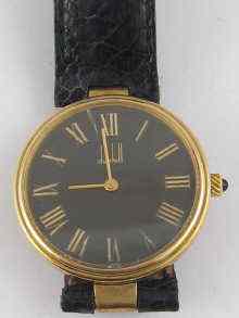 Appraisal: A silver gilt quartz gent's wrist watch by Dunhill