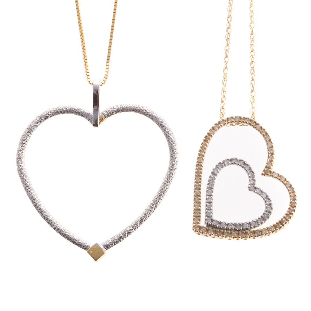 Appraisal: A Pair of K Two Toned Open Heart Pendants K