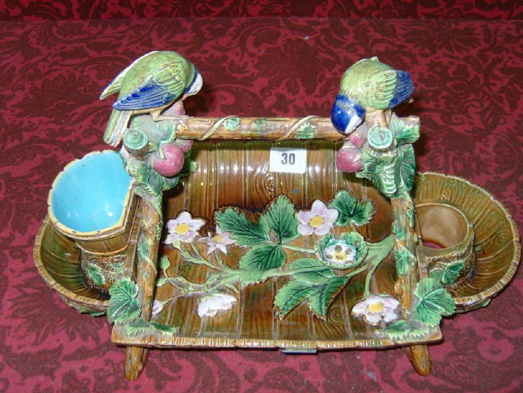 Appraisal: A th century majolica strawberry dish by George Jones in