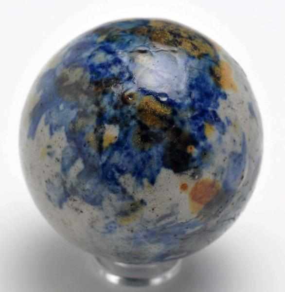 Appraisal: Large Stoneware Marble Description Stoneware decorated in blue and brown