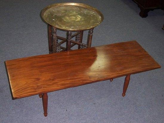 Appraisal: A folding table with circular brass tray top and a