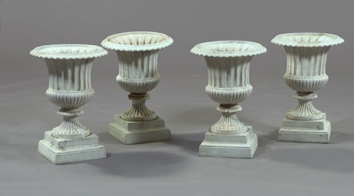 Appraisal: Pair of Neoclassical-Style Polychromed Cast-Aluminum Garden Urns of fluted campana