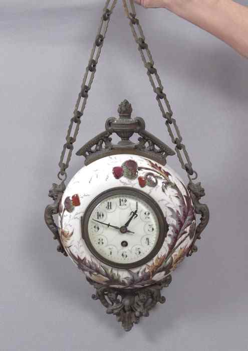 Appraisal: FRENCH PORCELAIN HANGING CLOCK Porcelain case with raised thistle design