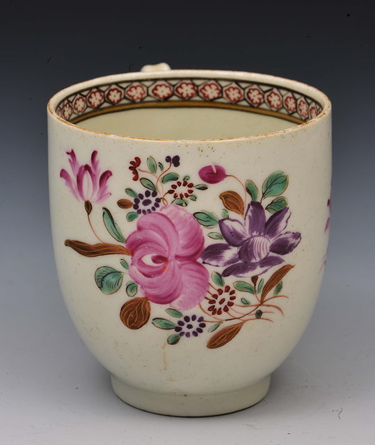 Appraisal: Worcester coffee cupcirca decorated in polychrome enamels showing Oriental flowers