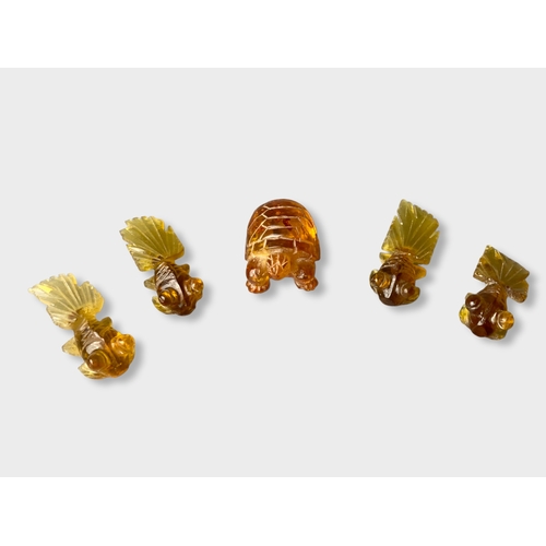 Appraisal: Four Chinese Amber glass fish figures a tortoise Tortoise -