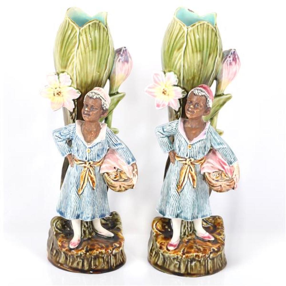 Appraisal: PAIR OF MAJOLICA FIGURAL VASES WITH BLACK AMERICANA GIRL WITH