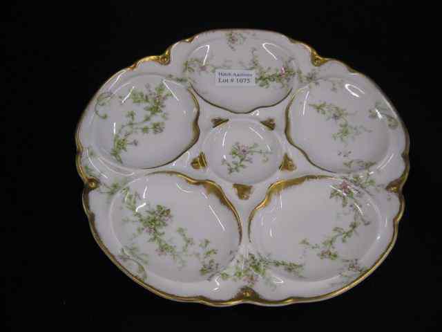 Appraisal: Theodore Haviland Limoges Oyster Plate flowering vine gold trim circa