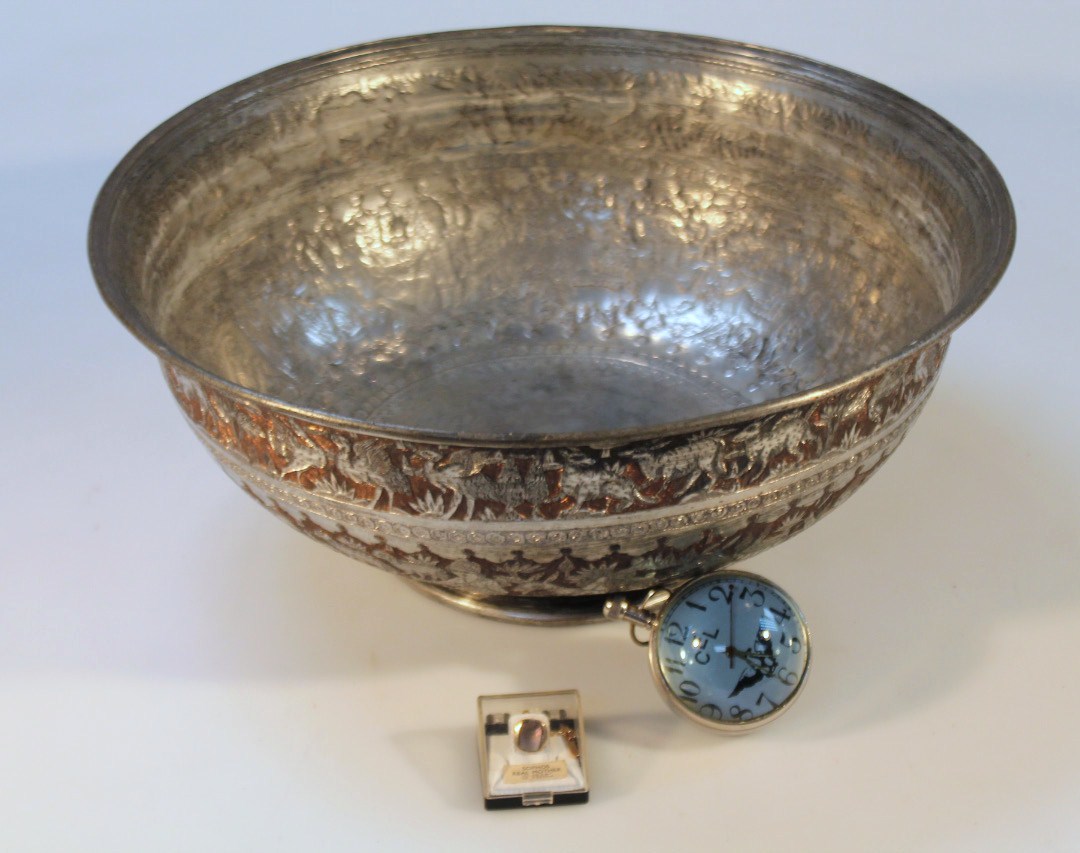 Appraisal: An early thC Indian metal bowl the circular body heavily