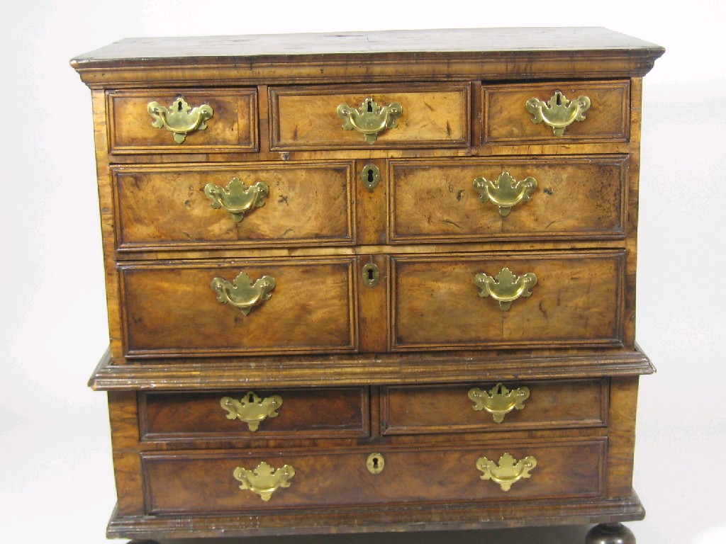 Appraisal: A late th Century walnut Chest with cross-banded top above