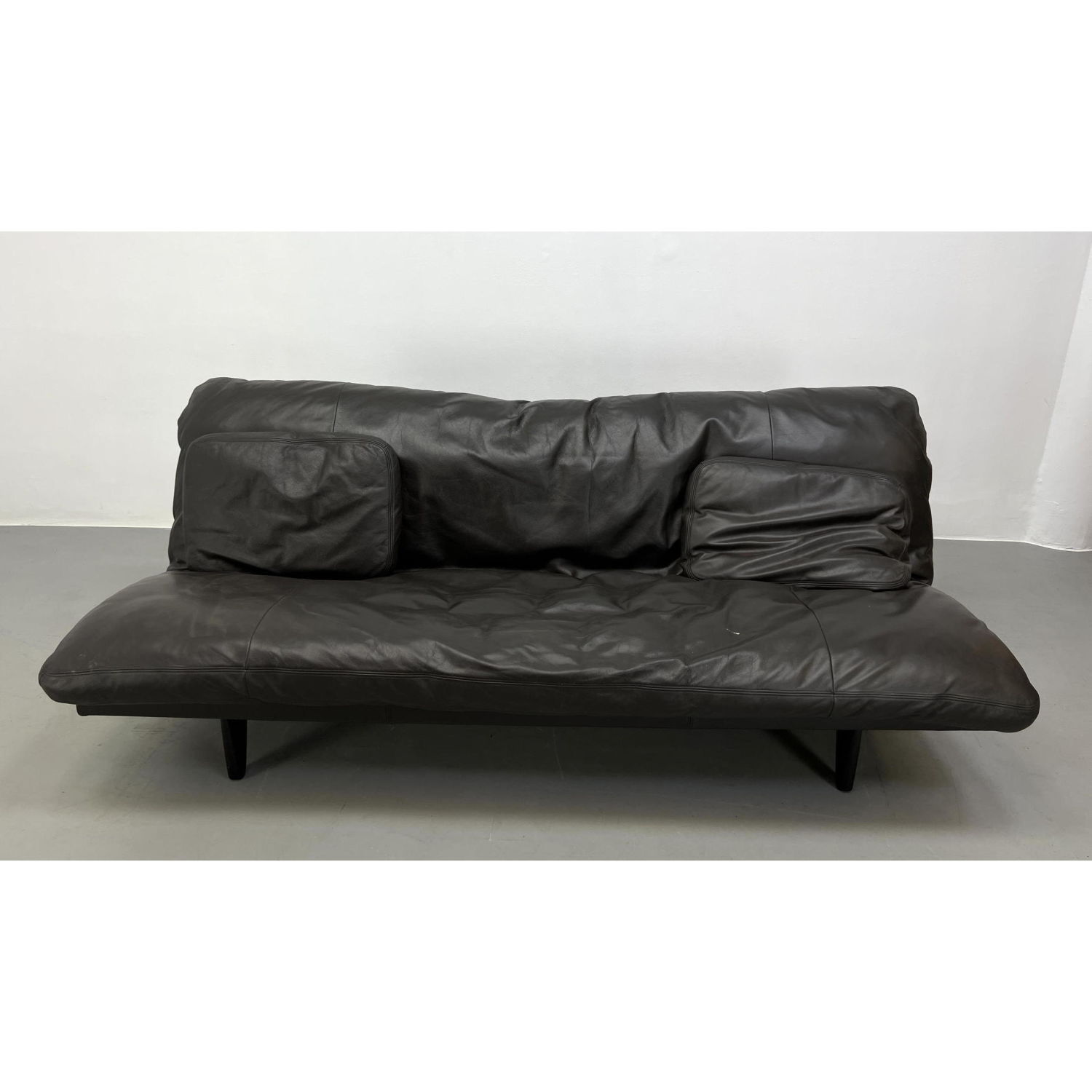 Appraisal: De Sede Black Leather Sofa Couch Daybed Two toss pillows